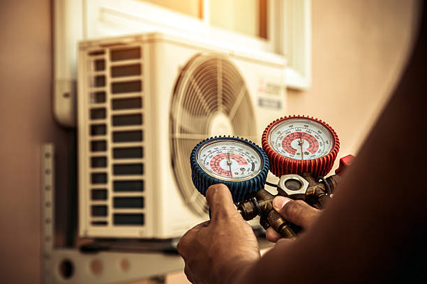 Professional Heat Pump Repair technician working in Thompson, OH